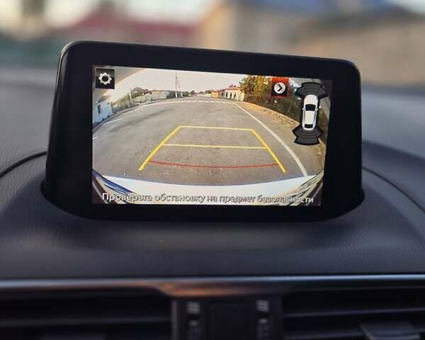 Білий Мазда 3, об'ємом двигуна 1.5 л та пробігом 107 тис. км за 14700 $, фото 10 на Automoto.ua