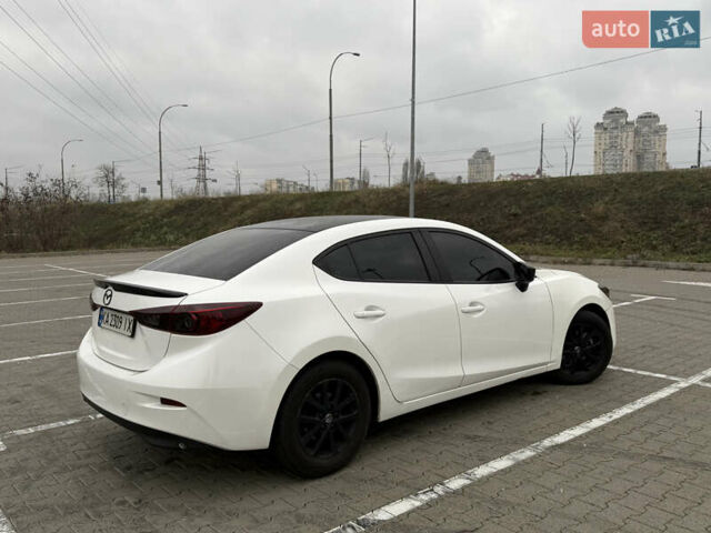 Белый Мазда 3, объемом двигателя 2 л и пробегом 173 тыс. км за 10500 $, фото 1 на Automoto.ua