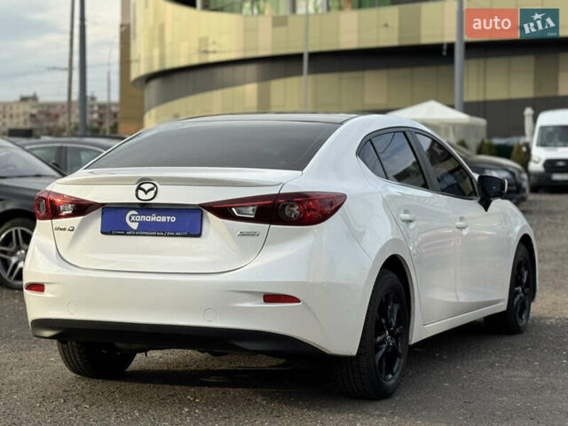 Белый Мазда 3, объемом двигателя 2 л и пробегом 39 тыс. км за 13500 $, фото 4 на Automoto.ua