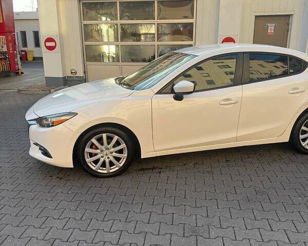 Белый Мазда 3, объемом двигателя 2 л и пробегом 109 тыс. км за 11800 $, фото 3 на Automoto.ua