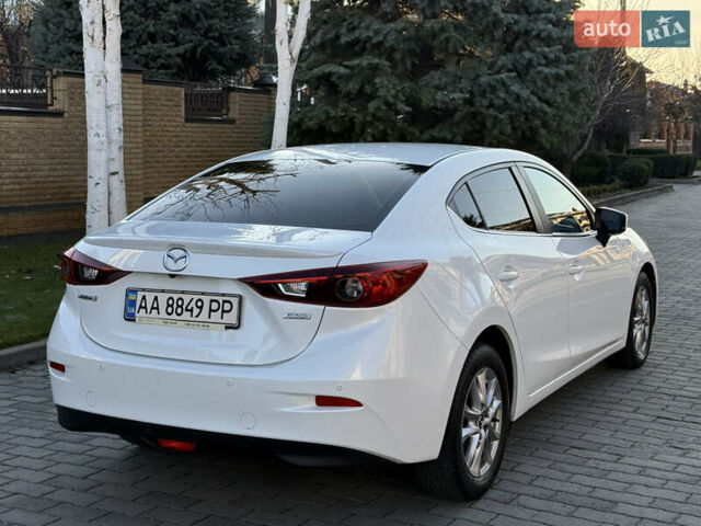 Білий Мазда 3, об'ємом двигуна 1.5 л та пробігом 96 тис. км за 15500 $, фото 7 на Automoto.ua