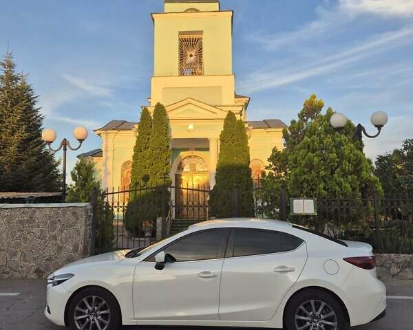 Білий Мазда 3, об'ємом двигуна 1.5 л та пробігом 107 тис. км за 14700 $, фото 2 на Automoto.ua