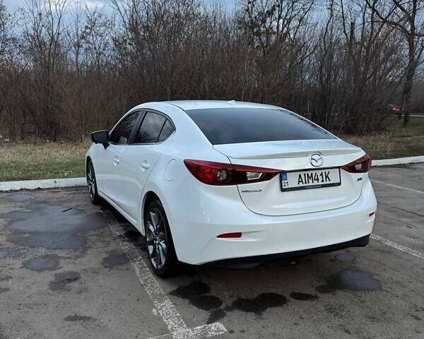 Білий Мазда 3, об'ємом двигуна 2.49 л та пробігом 108 тис. км за 12800 $, фото 9 на Automoto.ua
