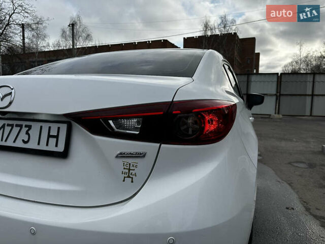 Белый Мазда 3, объемом двигателя 2 л и пробегом 196 тыс. км за 11000 $, фото 9 на Automoto.ua