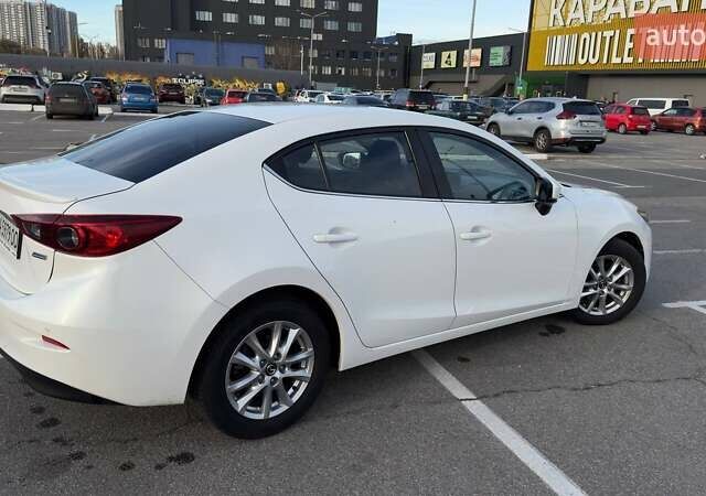 Білий Мазда 3, об'ємом двигуна 1.5 л та пробігом 144 тис. км за 13500 $, фото 5 на Automoto.ua