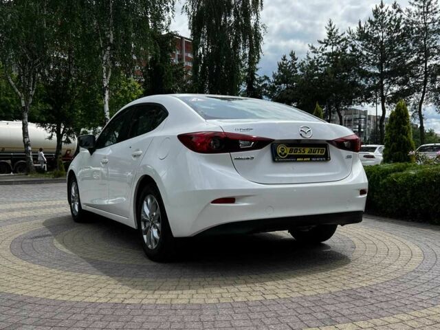 Білий Мазда 3, об'ємом двигуна 2 л та пробігом 137 тис. км за 12300 $, фото 4 на Automoto.ua