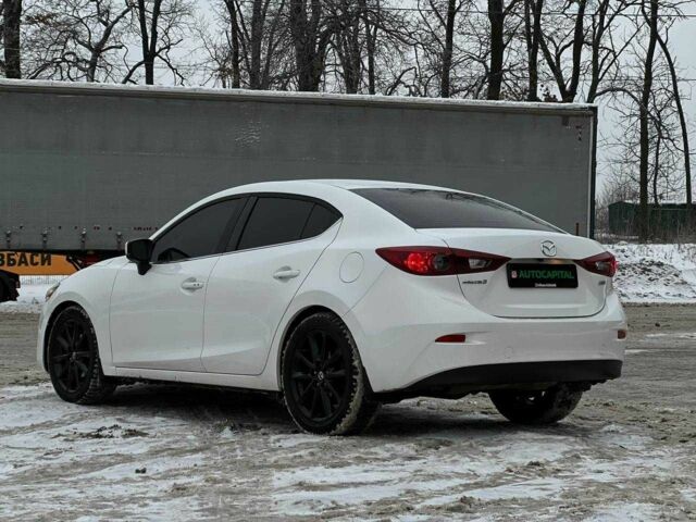 Белый Мазда 3, объемом двигателя 2 л и пробегом 196 тыс. км за 10990 $, фото 7 на Automoto.ua