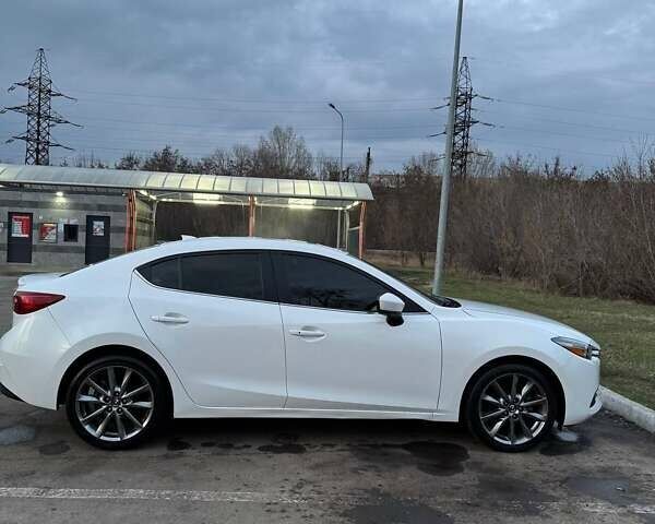 Білий Мазда 3, об'ємом двигуна 2.49 л та пробігом 108 тис. км за 12800 $, фото 6 на Automoto.ua