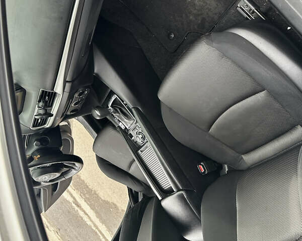 Белый Мазда 3, объемом двигателя 2 л и пробегом 196 тыс. км за 11000 $, фото 24 на Automoto.ua