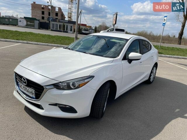 Білий Мазда 3, об'ємом двигуна 2 л та пробігом 110 тис. км за 10700 $, фото 7 на Automoto.ua