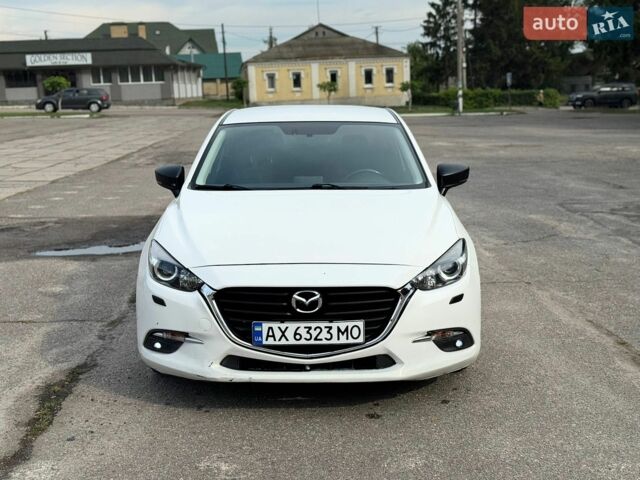 Білий Мазда 3, об'ємом двигуна 1.5 л та пробігом 103 тис. км за 9000 $, фото 1 на Automoto.ua