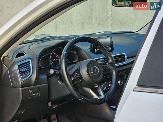 Білий Мазда 3, об'ємом двигуна 1.5 л та пробігом 86 тис. км за 14700 $, фото 19 на Automoto.ua