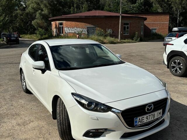 Белый Мазда 3, объемом двигателя 1.5 л и пробегом 58 тыс. км за 17500 $, фото 1 на Automoto.ua