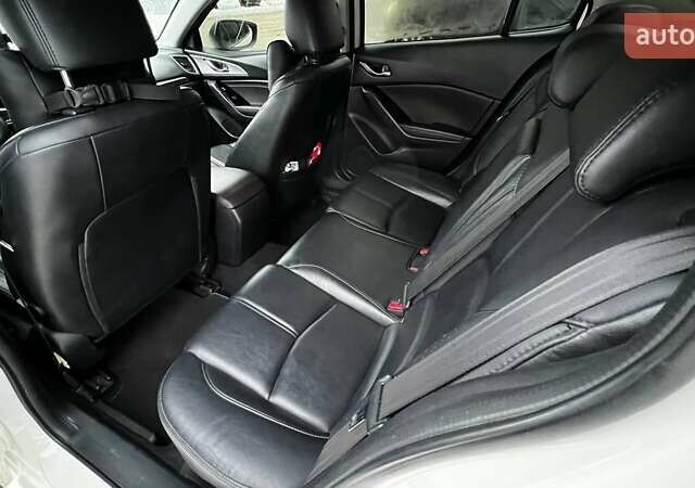 Белый Мазда 3, объемом двигателя 2 л и пробегом 196 тыс. км за 10990 $, фото 27 на Automoto.ua