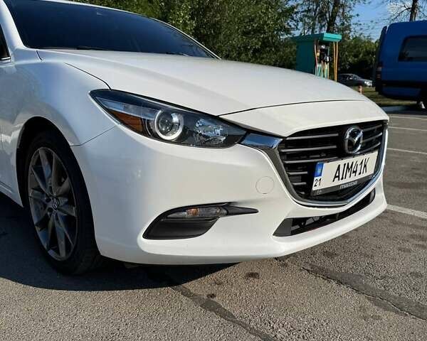 Білий Мазда 3, об'ємом двигуна 2.49 л та пробігом 108 тис. км за 12800 $, фото 16 на Automoto.ua