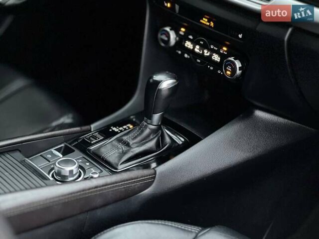 Белый Мазда 3, объемом двигателя 2 л и пробегом 196 тыс. км за 10990 $, фото 39 на Automoto.ua