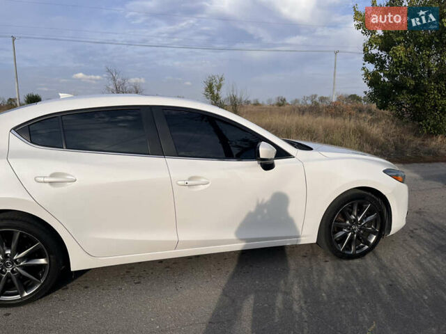 Белый Мазда 3, объемом двигателя 2.49 л и пробегом 110 тыс. км за 15700 $, фото 7 на Automoto.ua