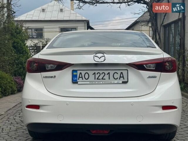 Белый Мазда 3, объемом двигателя 1.5 л и пробегом 170 тыс. км за 13500 $, фото 1 на Automoto.ua