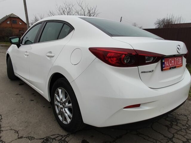 Белый Мазда 3, объемом двигателя 2 л и пробегом 202 тыс. км за 11800 $, фото 2 на Automoto.ua