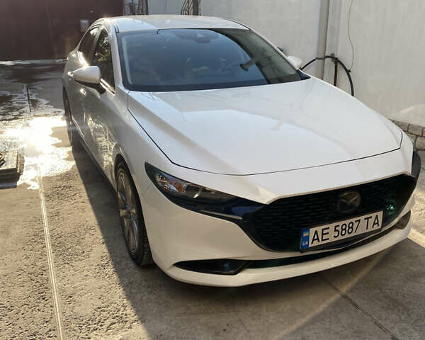 Белый Мазда 3, объемом двигателя 2.49 л и пробегом 80 тыс. км за 19100 $, фото 1 на Automoto.ua