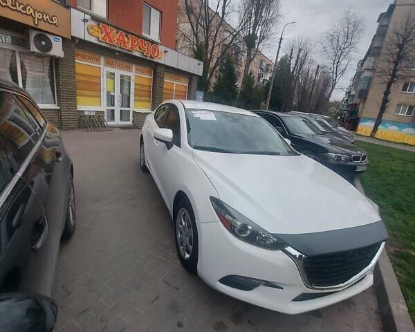 Білий Мазда 3, об'ємом двигуна 2 л та пробігом 80 тис. км за 14200 $, фото 2 на Automoto.ua