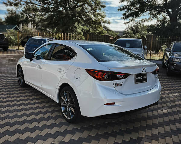 Білий Мазда 3, об'ємом двигуна 2.5 л та пробігом 103 тис. км за 15000 $, фото 4 на Automoto.ua