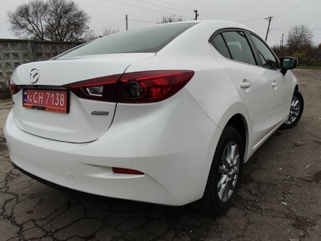 Белый Мазда 3, объемом двигателя 2 л и пробегом 202 тыс. км за 11800 $, фото 3 на Automoto.ua