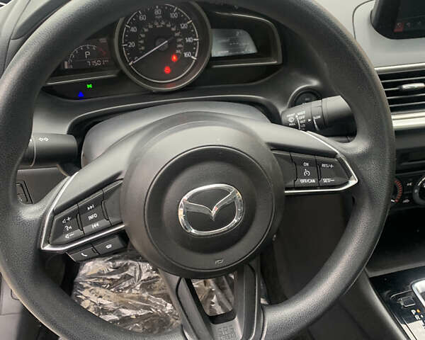 Білий Мазда 3, об'ємом двигуна 2 л та пробігом 72 тис. км за 12800 $, фото 12 на Automoto.ua