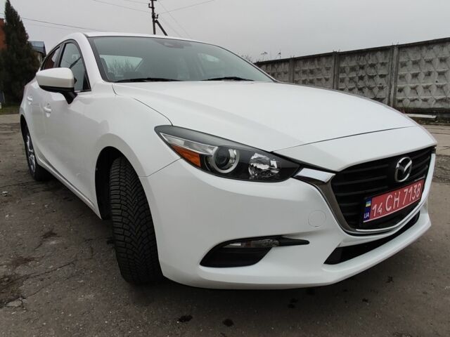 Белый Мазда 3, объемом двигателя 2 л и пробегом 202 тыс. км за 11800 $, фото 1 на Automoto.ua