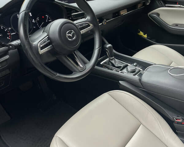 Белый Мазда 3, объемом двигателя 2.49 л и пробегом 95 тыс. км за 16399 $, фото 8 на Automoto.ua