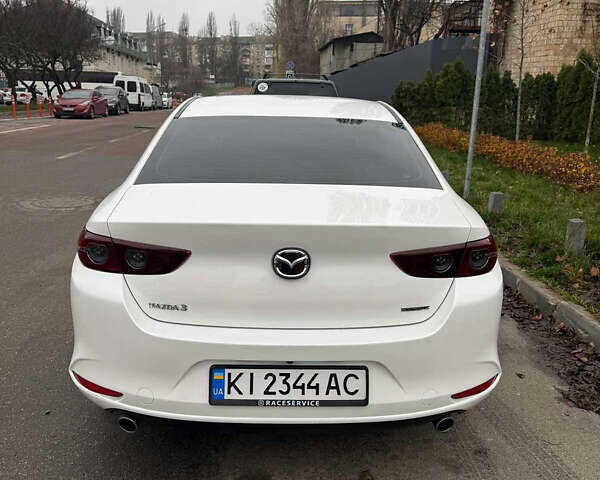 Белый Мазда 3, объемом двигателя 2.49 л и пробегом 95 тыс. км за 16399 $, фото 4 на Automoto.ua