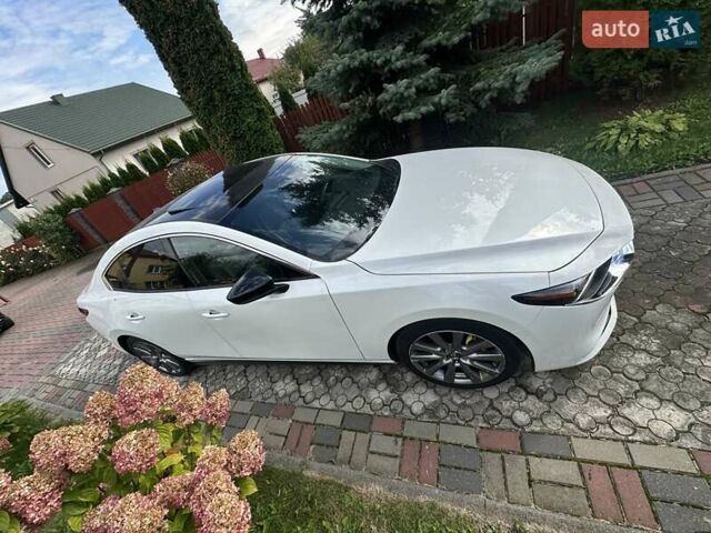 Білий Мазда 3, об'ємом двигуна 2.49 л та пробігом 83 тис. км за 17200 $, фото 2 на Automoto.ua