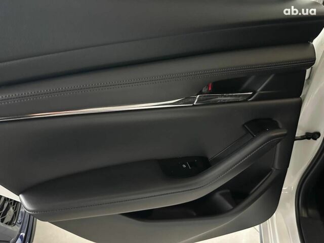 Белый Мазда 3, объемом двигателя 2.5 л и пробегом 57 тыс. км за 16440 $, фото 12 на Automoto.ua