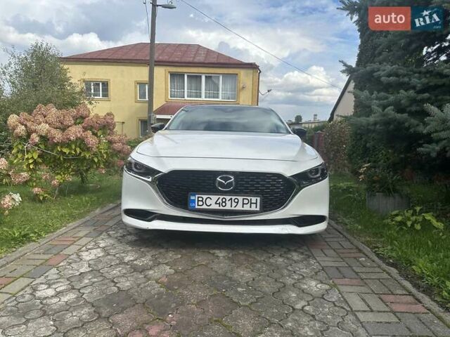 Білий Мазда 3, об'ємом двигуна 2.49 л та пробігом 83 тис. км за 17200 $, фото 6 на Automoto.ua