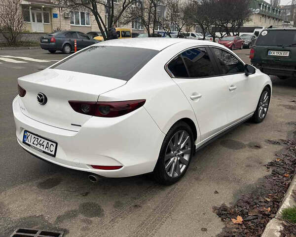 Белый Мазда 3, объемом двигателя 2.49 л и пробегом 95 тыс. км за 16399 $, фото 3 на Automoto.ua