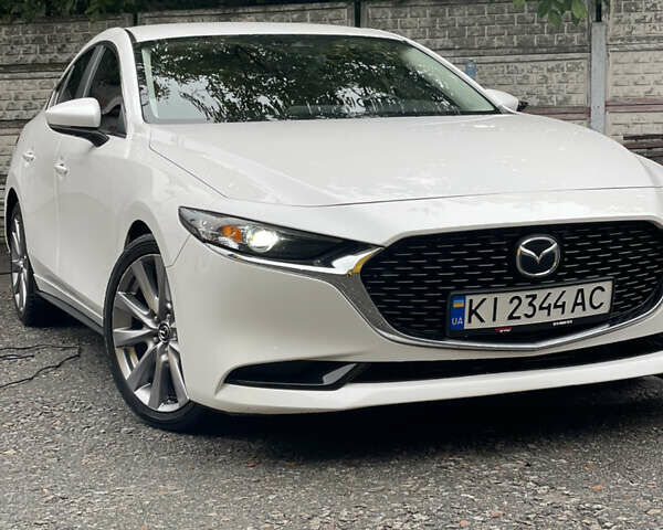 Білий Мазда 3, об'ємом двигуна 2.49 л та пробігом 95 тис. км за 16999 $, фото 4 на Automoto.ua