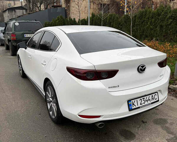 Белый Мазда 3, объемом двигателя 2.49 л и пробегом 95 тыс. км за 16399 $, фото 5 на Automoto.ua