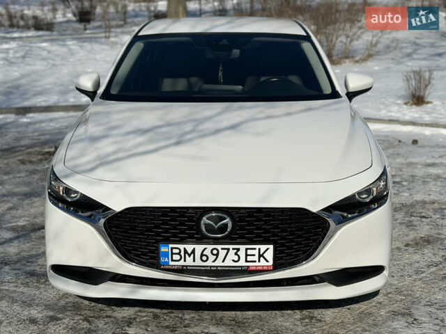 Білий Мазда 3, об'ємом двигуна 2.49 л та пробігом 130 тис. км за 16000 $, фото 7 на Automoto.ua