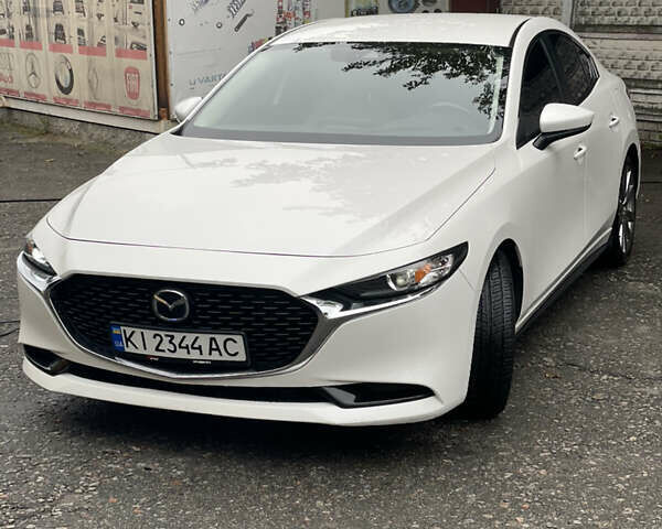 Білий Мазда 3, об'ємом двигуна 2.49 л та пробігом 95 тис. км за 16999 $, фото 1 на Automoto.ua