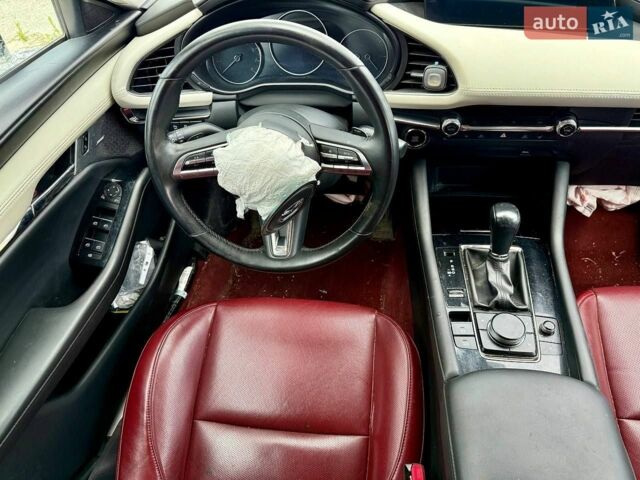 Білий Мазда 3, об'ємом двигуна 2.49 л та пробігом 76 тис. км за 10500 $, фото 35 на Automoto.ua