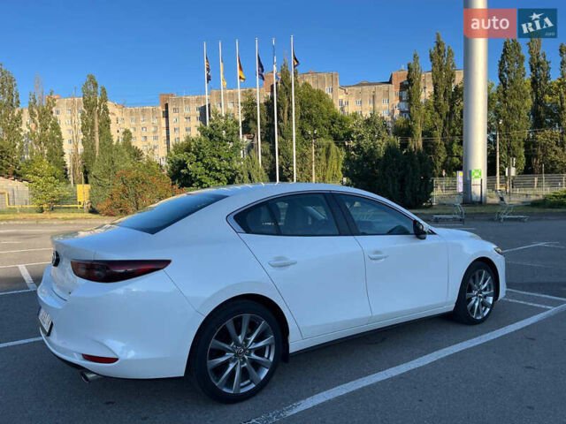 Белый Мазда 3, объемом двигателя 2.49 л и пробегом 112 тыс. км за 17650 $, фото 2 на Automoto.ua