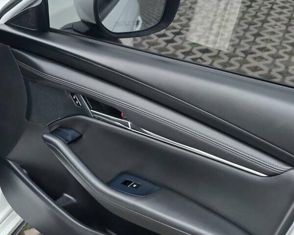 Белый Мазда 3, объемом двигателя 2.49 л и пробегом 140 тыс. км за 14950 $, фото 2 на Automoto.ua