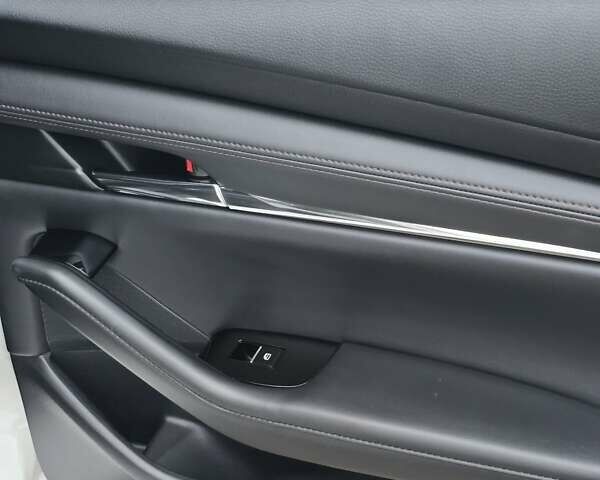 Белый Мазда 3, объемом двигателя 2.49 л и пробегом 140 тыс. км за 14950 $, фото 8 на Automoto.ua