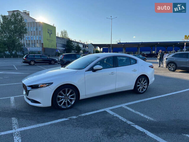 Белый Мазда 3, объемом двигателя 2.49 л и пробегом 112 тыс. км за 17650 $, фото 5 на Automoto.ua