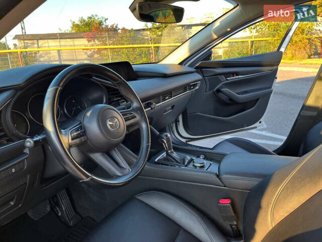 Белый Мазда 3, объемом двигателя 2.49 л и пробегом 112 тыс. км за 17650 $, фото 7 на Automoto.ua