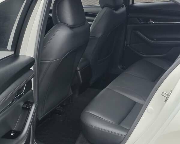 Белый Мазда 3, объемом двигателя 2.49 л и пробегом 140 тыс. км за 14950 $, фото 9 на Automoto.ua