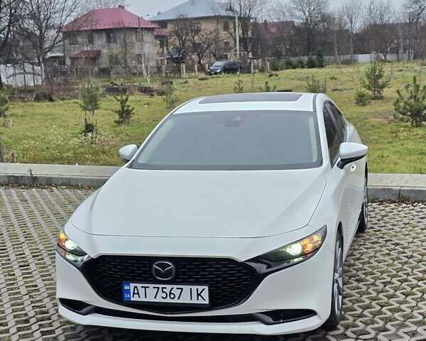 Белый Мазда 3, объемом двигателя 2.49 л и пробегом 140 тыс. км за 14950 $, фото 14 на Automoto.ua