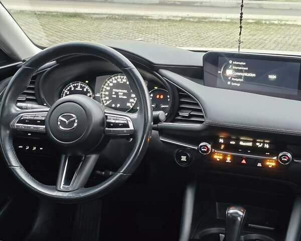 Белый Мазда 3, объемом двигателя 2.49 л и пробегом 140 тыс. км за 14950 $, фото 43 на Automoto.ua