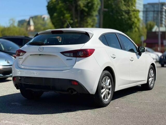 Белый Мазда 3, объемом двигателя 2 л и пробегом 94 тыс. км за 1890 $, фото 6 на Automoto.ua