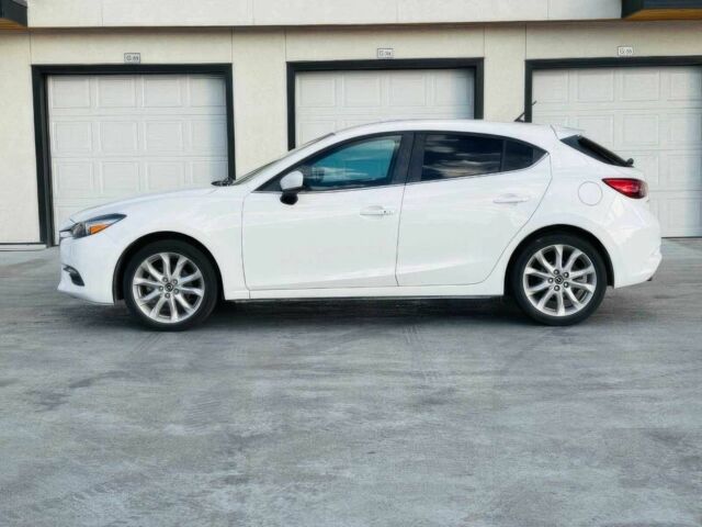 Білий Мазда 3, об'ємом двигуна 2 л та пробігом 56 тис. км за 3500 $, фото 3 на Automoto.ua